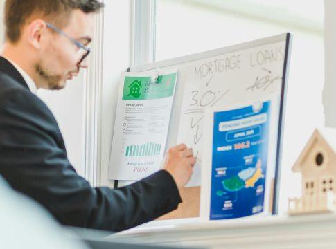 Illustration of a house being pulled apart by a mortgage lender's conflicting interests.